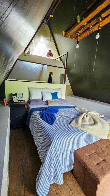 Postel nebo postele na pokoji v ubytování Flora Glamping de Abuela