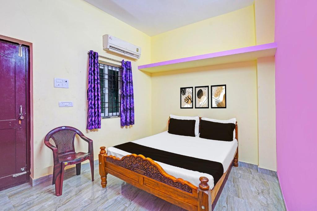 Postel nebo postele na pokoji v ubytování Hotel O Sai Residency