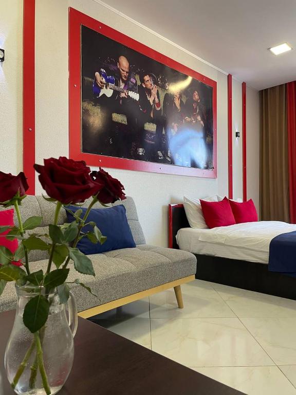 Postel nebo postele na pokoji v ubytování Rock Hotel First Line