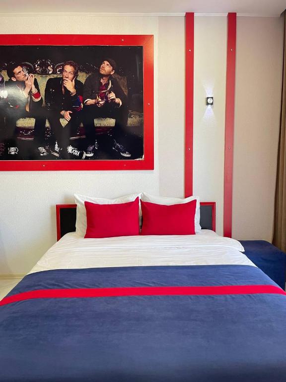 Postel nebo postele na pokoji v ubytování Rock Hotel First Line