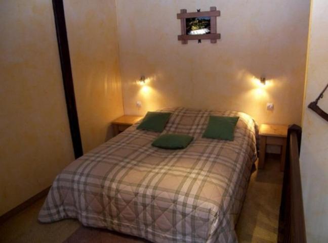 Postel nebo postele na pokoji v ubytování Caveau de l'ami Fritz
