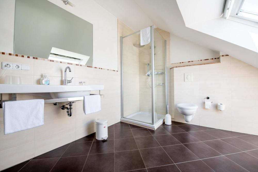 Koupelna v ubytování Garni Hotel Henn