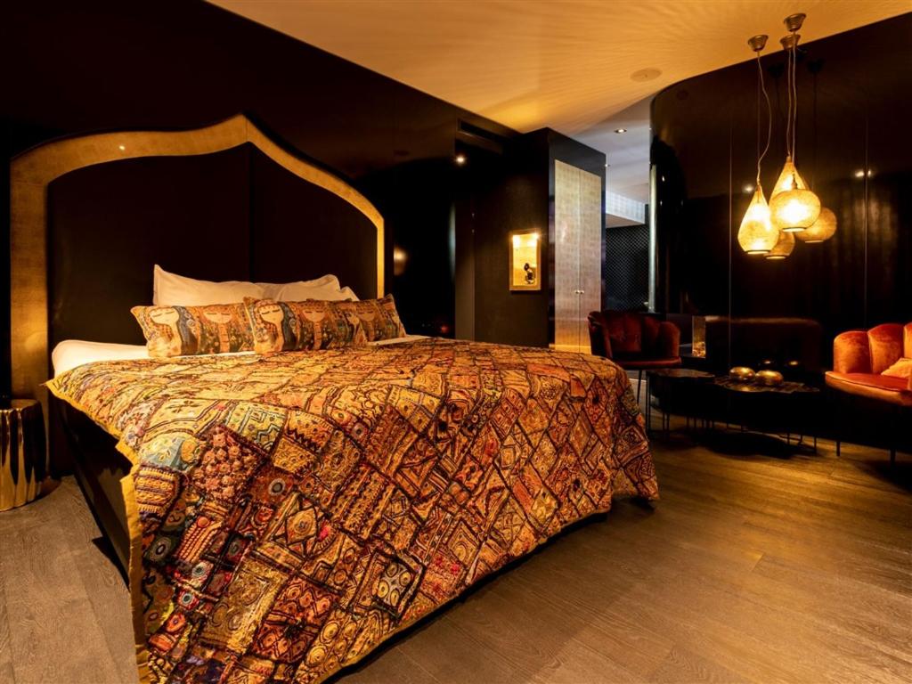 Postel nebo postele na pokoji v ubytování Van der Valk Hotel Houten Utrecht