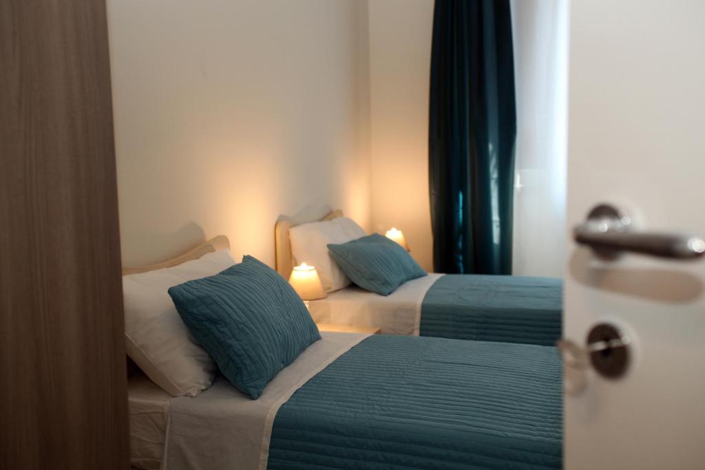 Posteľ alebo postele v izbe v ubytovaní Apartment Corso Cavour