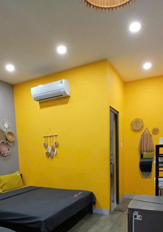 Postel nebo postele na pokoji v ubytování Thanh Hằng Homestay