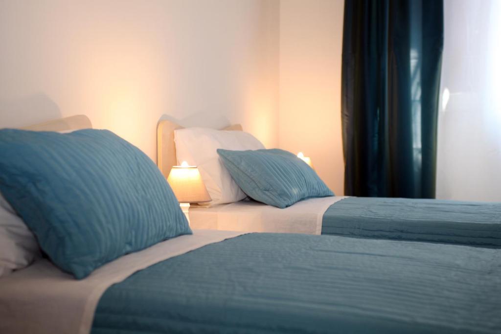 Posteľ alebo postele v izbe v ubytovaní Apartment Corso Cavour