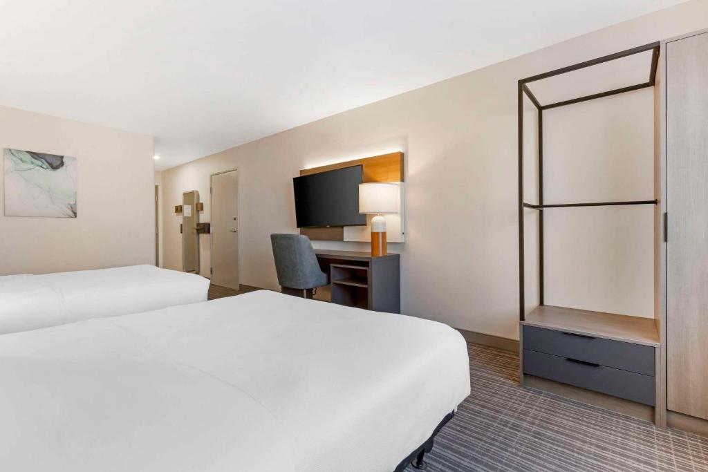 Postel nebo postele na pokoji v ubytování Comfort Suites at Tucson Mall