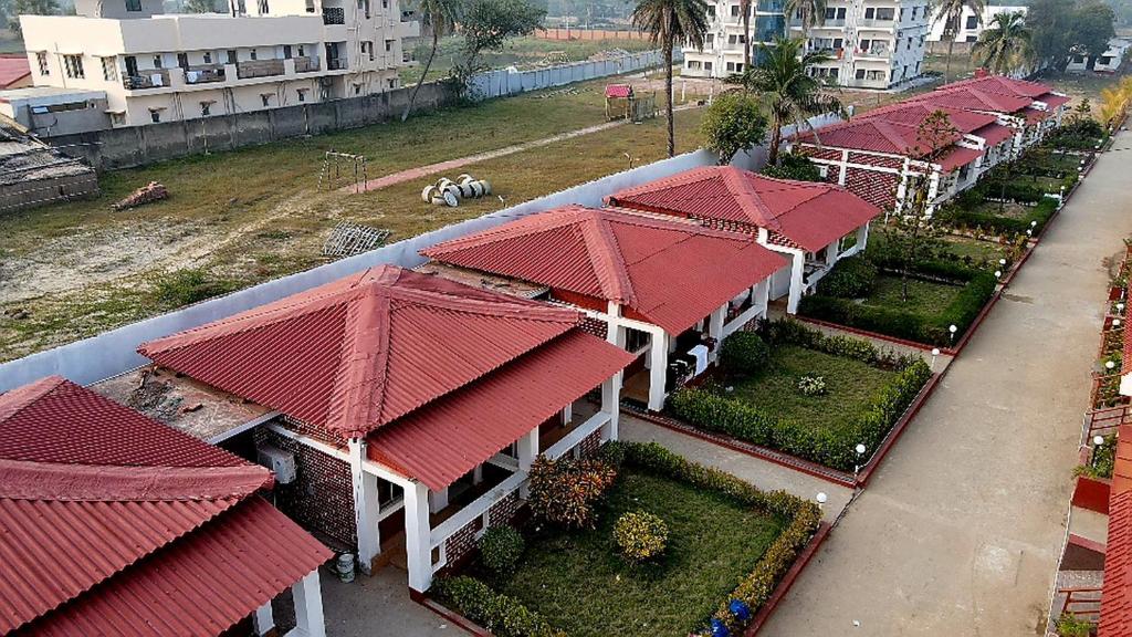 an overhead view of a building with red roofs at Ricardo Beach Resort in Mandarmoni