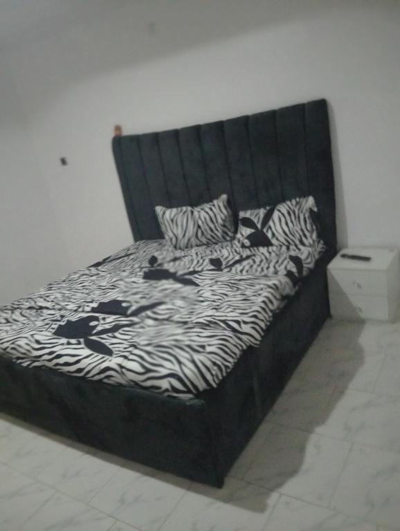 Postel nebo postele na pokoji v ubytování Fab shortlet apartment