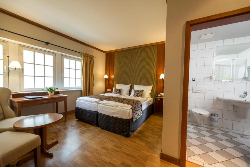 Postel nebo postele na pokoji v ubytování Berghotel Eisenach