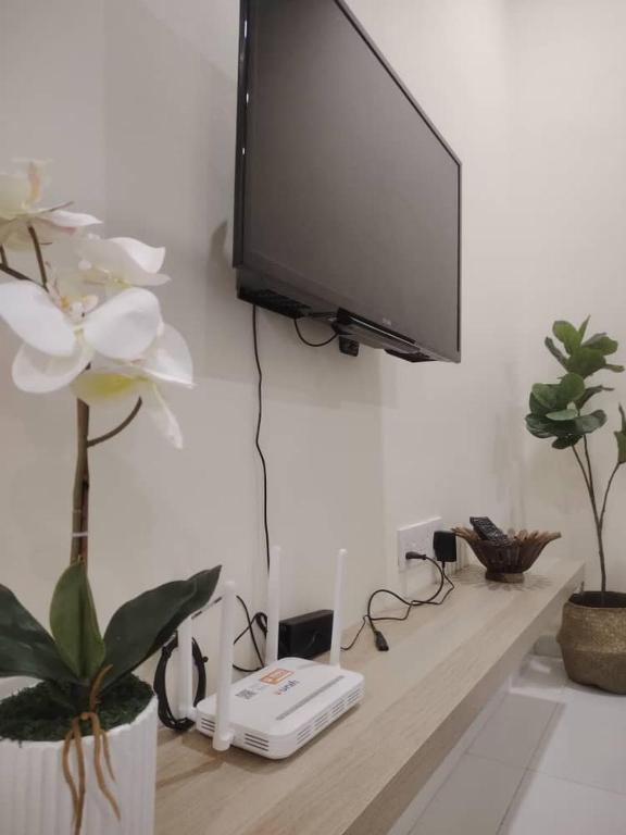 TV a/nebo společenská místnost v ubytování MAB Homestay