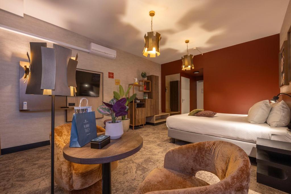 Postel nebo postele na pokoji v ubytování Fletcher Hotel-Restaurant Klein Zwitserland