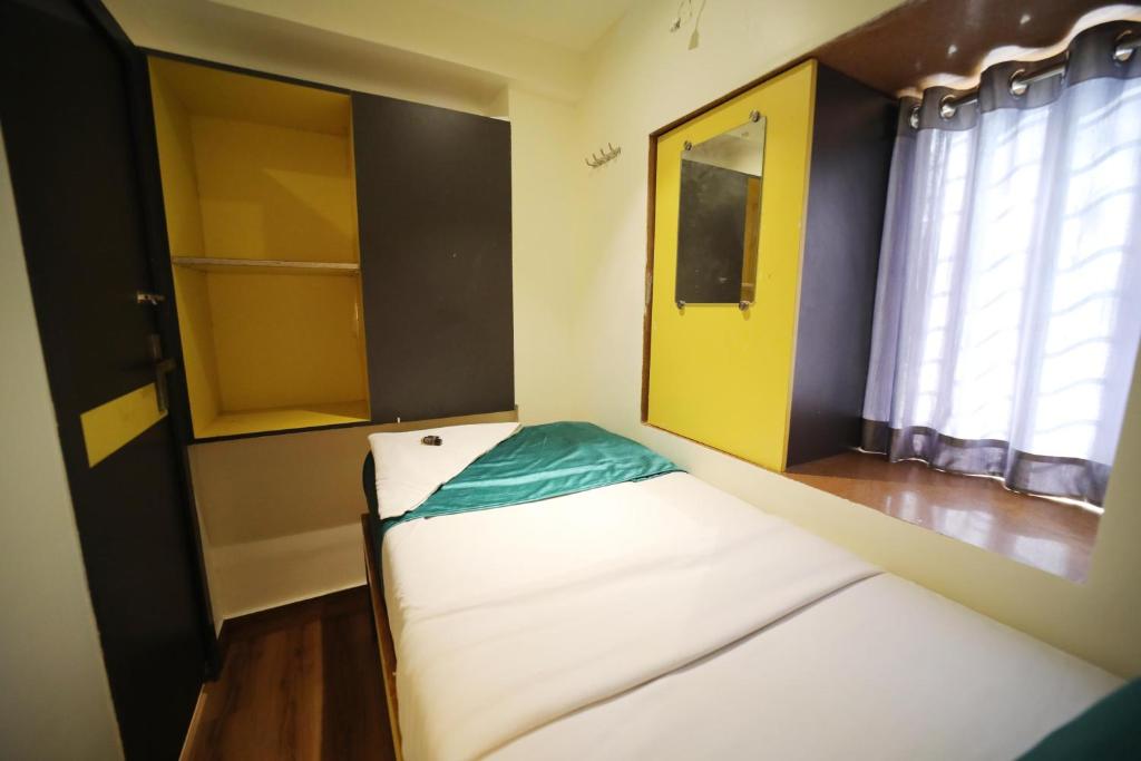 Postel nebo postele na pokoji v ubytování CABIN STAY-SOCIAL HUBZ