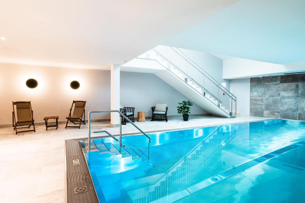 Bazén v ubytování HENRI Country House Kitzbühel nebo v jeho okolí