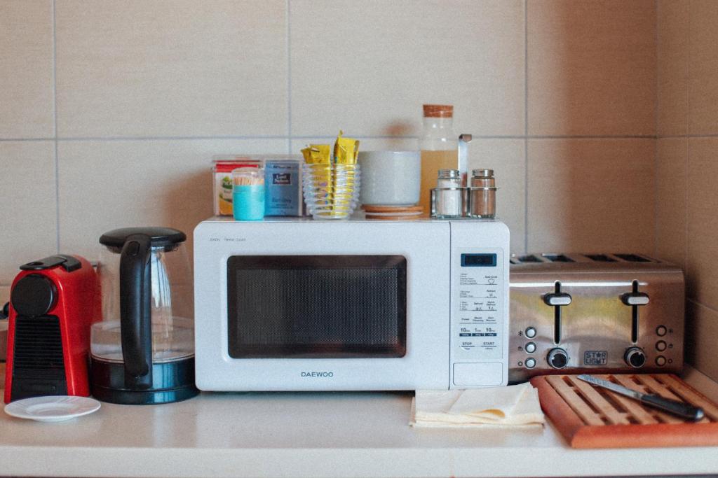 Kuchyň nebo kuchyňský kout v ubytování Megnyugtat-lak Apartmanház