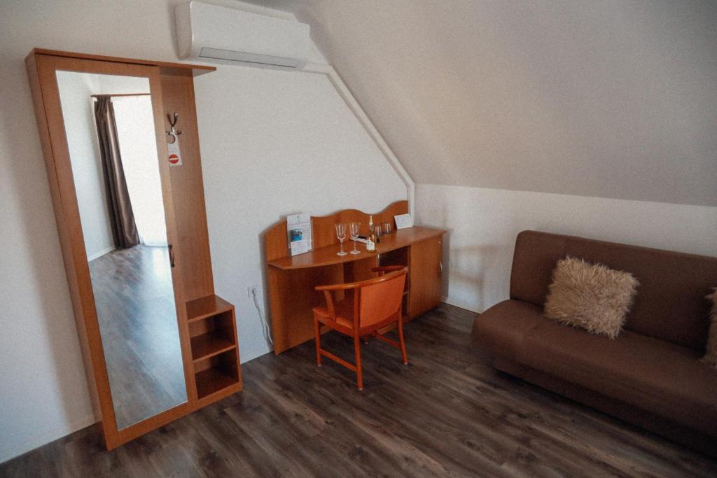 Posezení v ubytování Megnyugtat-lak Apartmanház