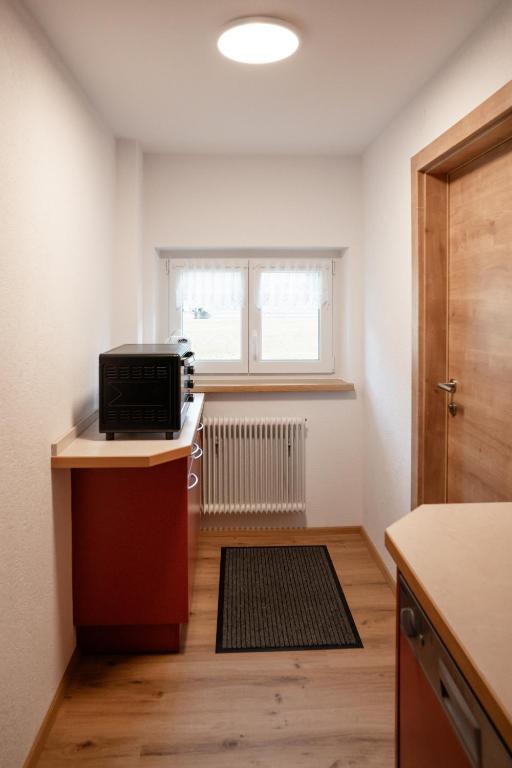 TV a/nebo společenská místnost v ubytování Gästehaus Schoder