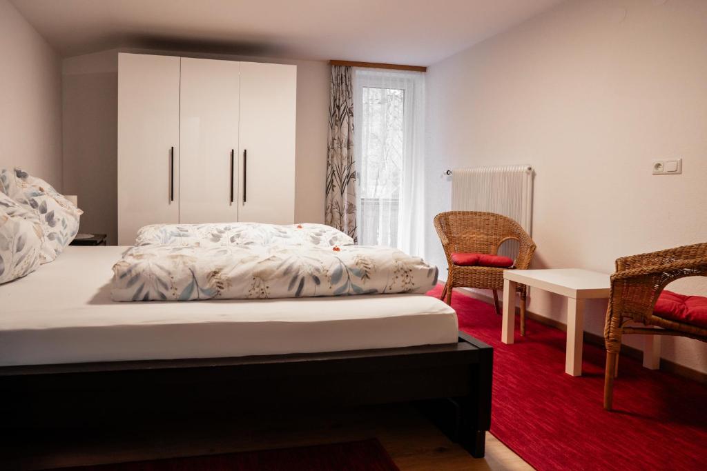 Postel nebo postele na pokoji v ubytování Gästehaus Schoder