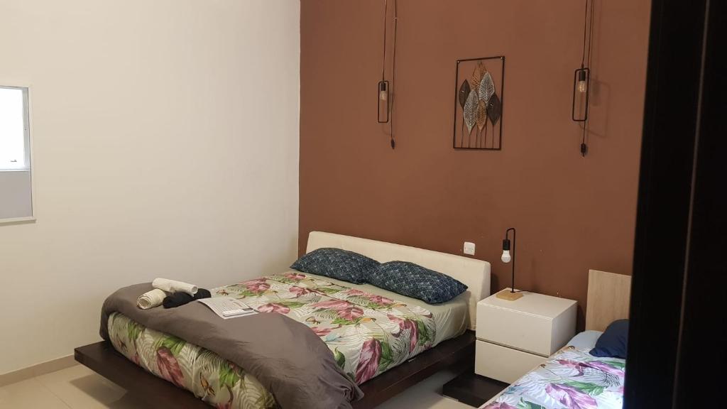 Postel nebo postele na pokoji v ubytování Central Sliema Stay Cozy for 4 guests, Air-Conditioned, Self Check-In