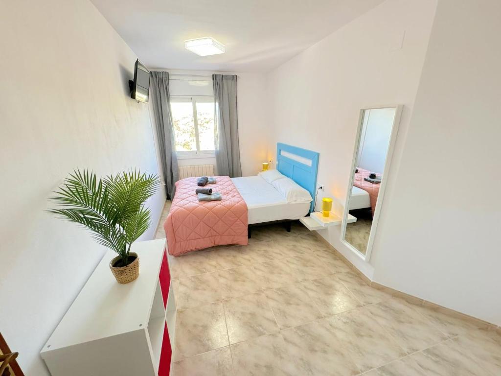 Posteľ alebo postele v izbe v ubytovaní Apartamento Costa Brava 22