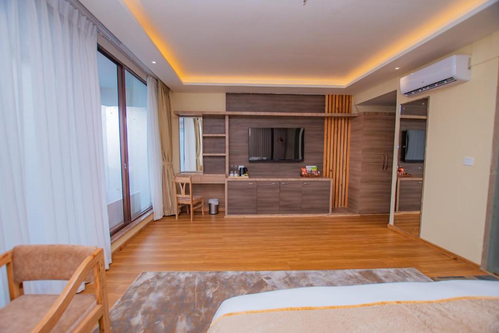 Rúm í herbergi á Temple Himalaya Hotel & Spa