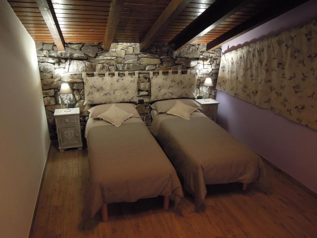 Postel nebo postele na pokoji v ubytování B&B Family and Group Bell'Ulivo