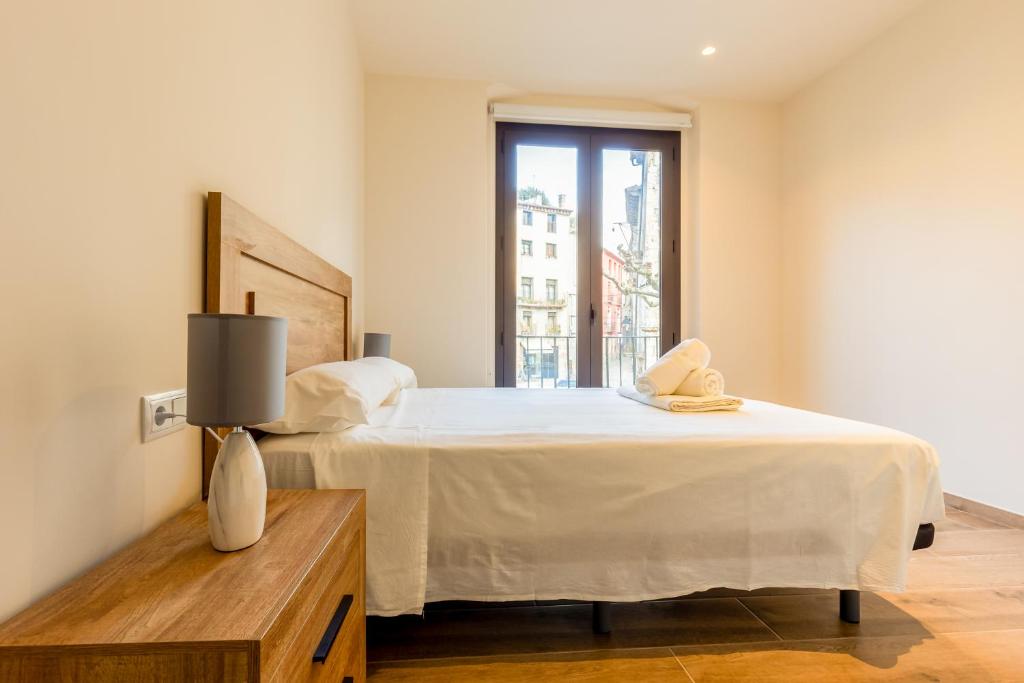 Posteľ alebo postele v izbe v ubytovaní Can Cintet 1- Apartamento en la plaza de Besalú