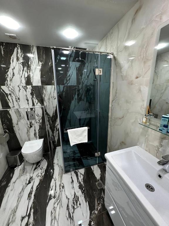 Koupelna v ubytování Hotel Roma & Tours