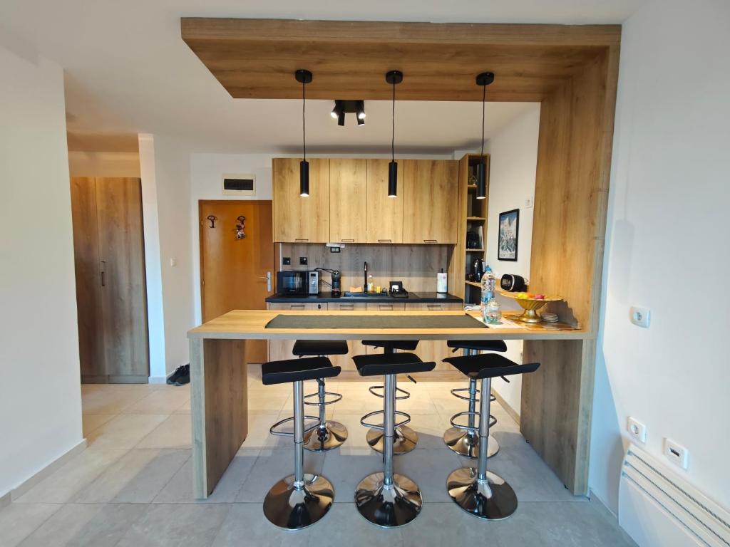 Kuchyň nebo kuchyňský kout v ubytování Friendly apartment -top location