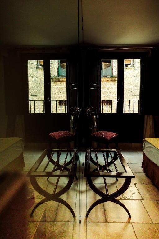 Posezení v ubytování Vico Regio Hotel