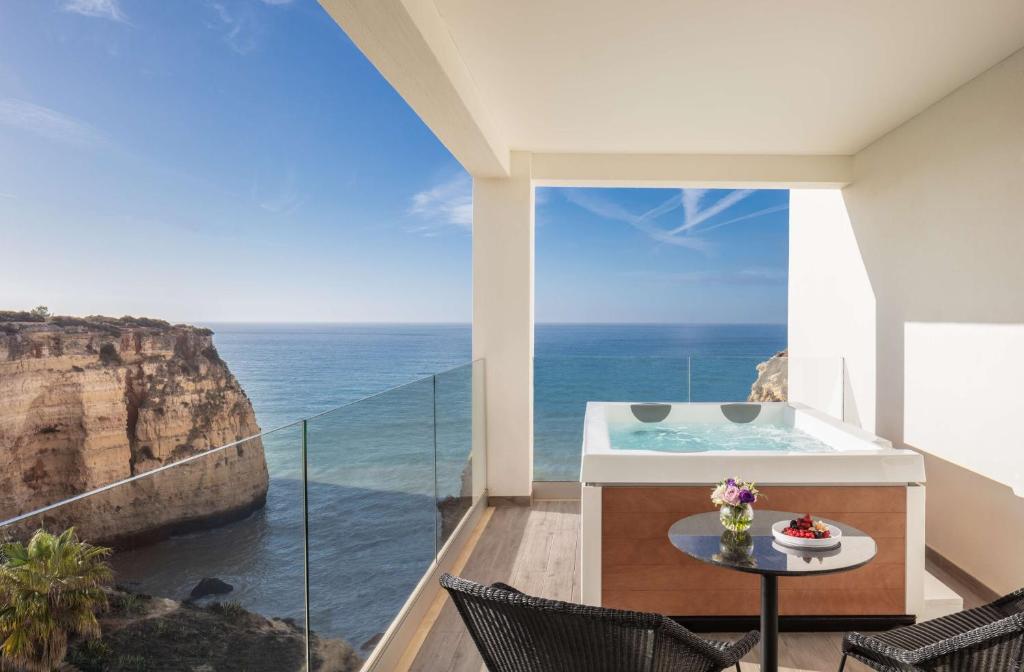 a house with a view of the ocean at Tivoli Carvoeiro in Carvoeiro