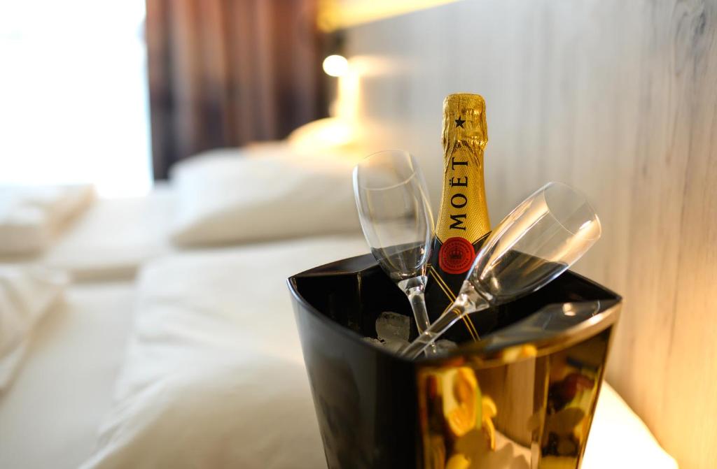 Postel nebo postele na pokoji v ubytování Akadémia Hotel