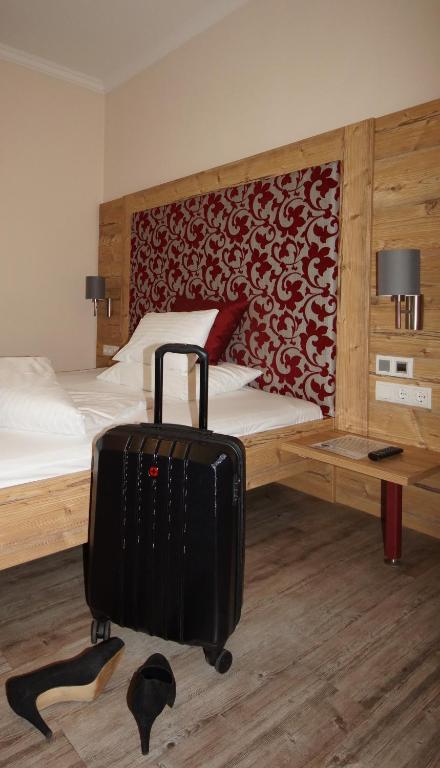 Postel nebo postele na pokoji v ubytování Der Marienhof Hotel Garni