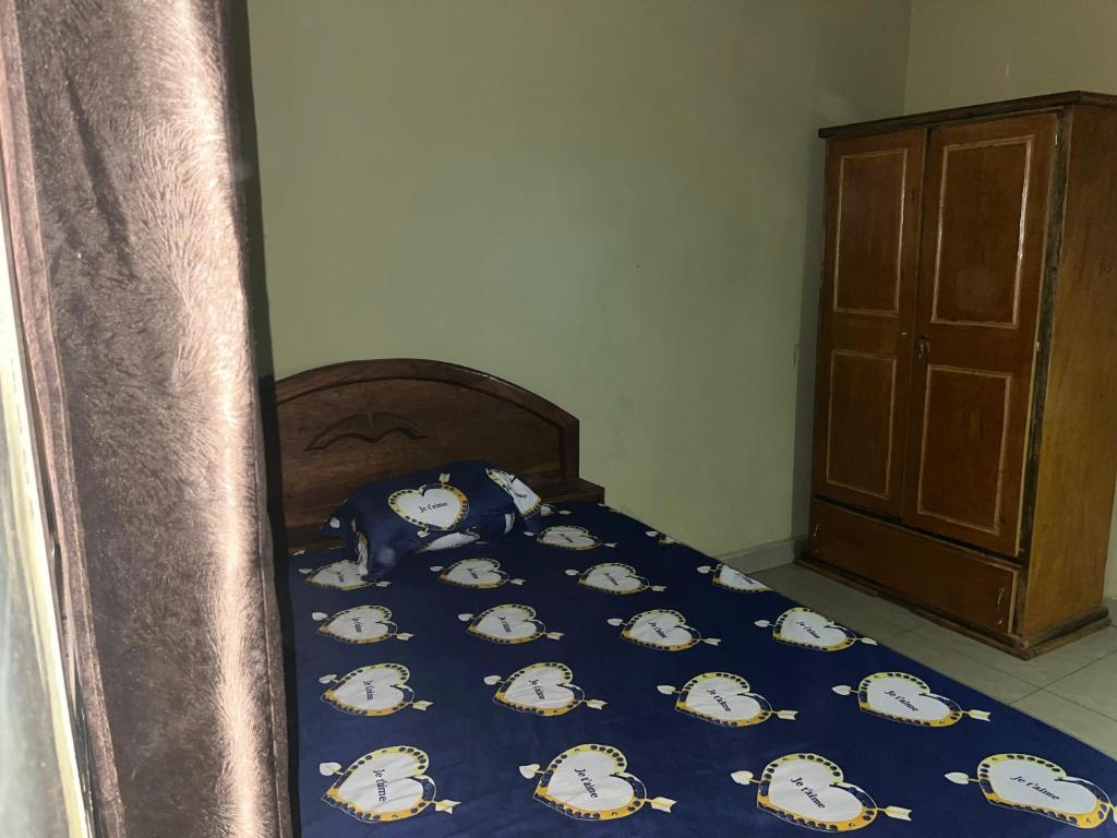 Postel nebo postele na pokoji v ubytování Résidence DEMBELE