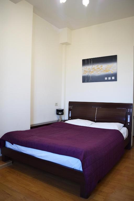 Postel nebo postele na pokoji v ubytování Hotel Grig