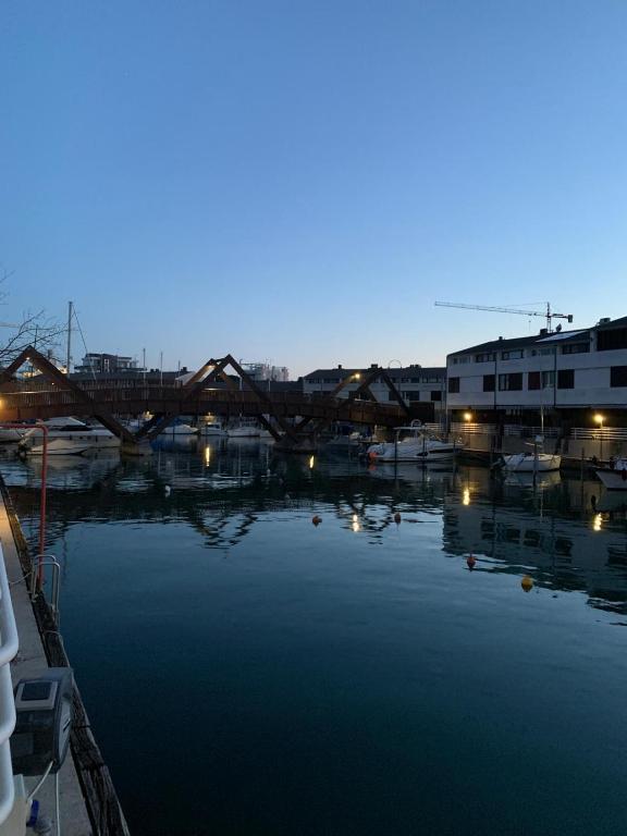 a view of a harbor with boats in the water at Punta Faro in Lignano Sabbiadoro