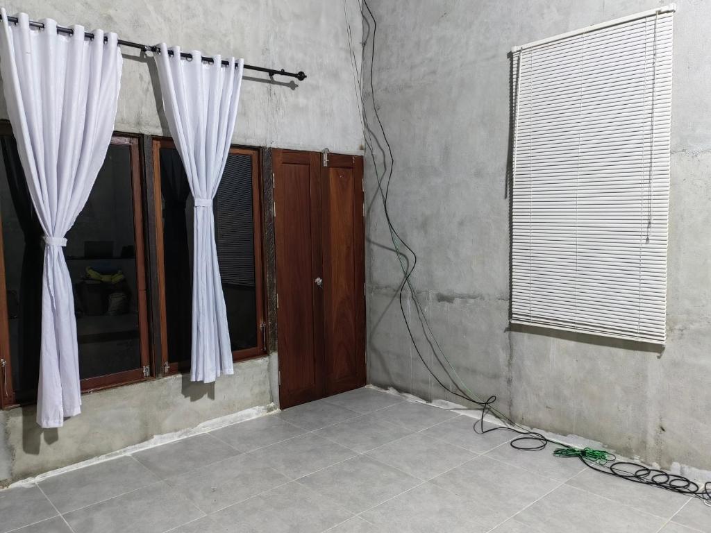 Fotografie z fotogalerie ubytování Aqlan Garden House v destinaci Tanjung