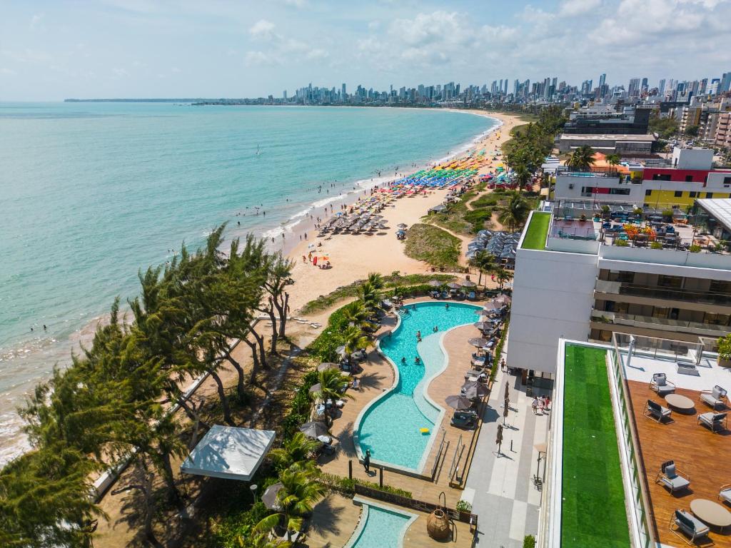 an aerial view of a beach and the ocean at Oceana Atlântico Hotel & SPA in João Pessoa