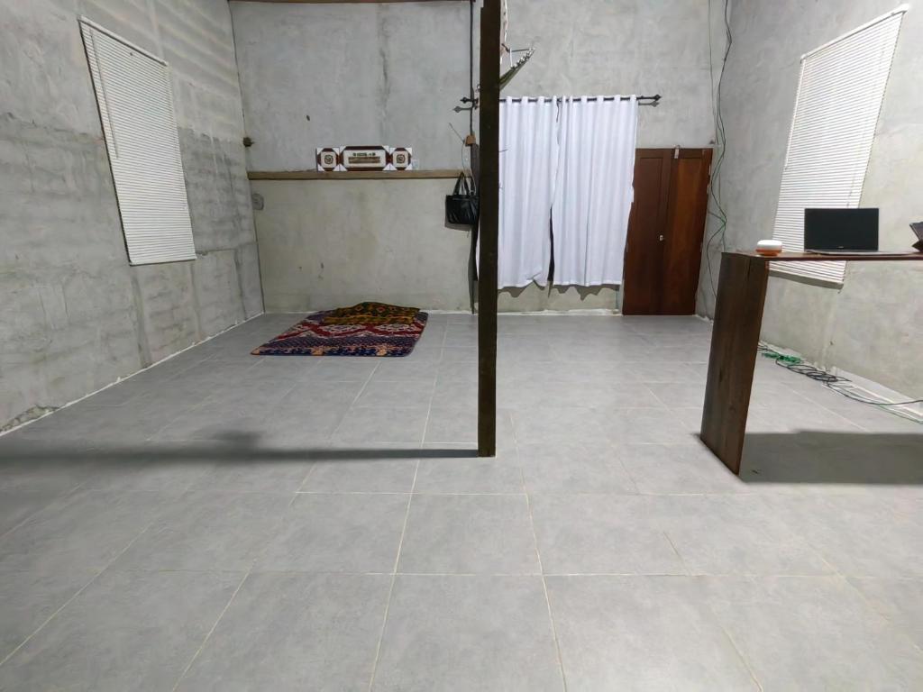 Postel nebo postele na pokoji v ubytování Aqlan Garden House