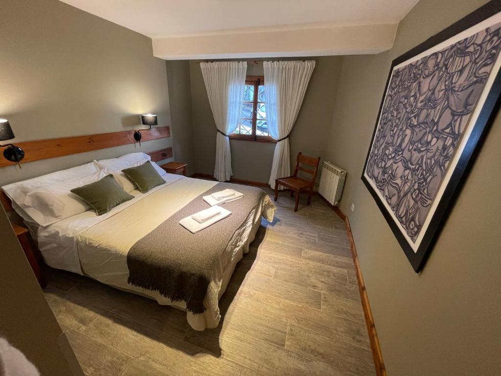 Uma cama ou camas num quarto em Las Marianas Hotel