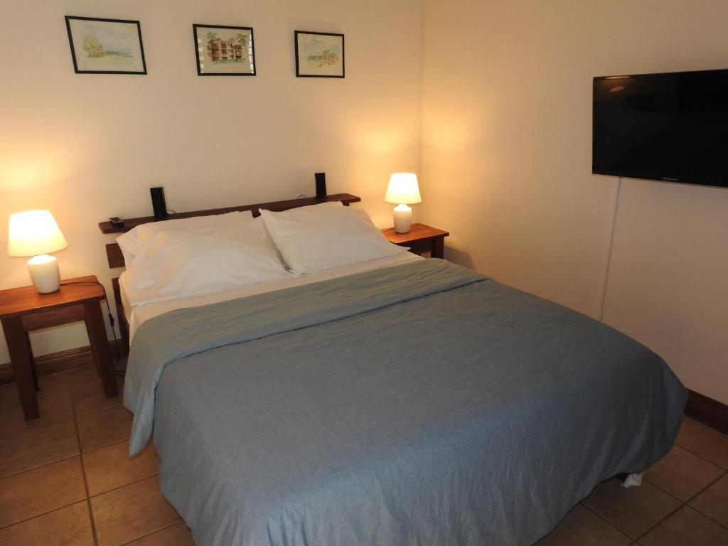 Postel nebo postele na pokoji v ubytování Playa Negra Guesthouse