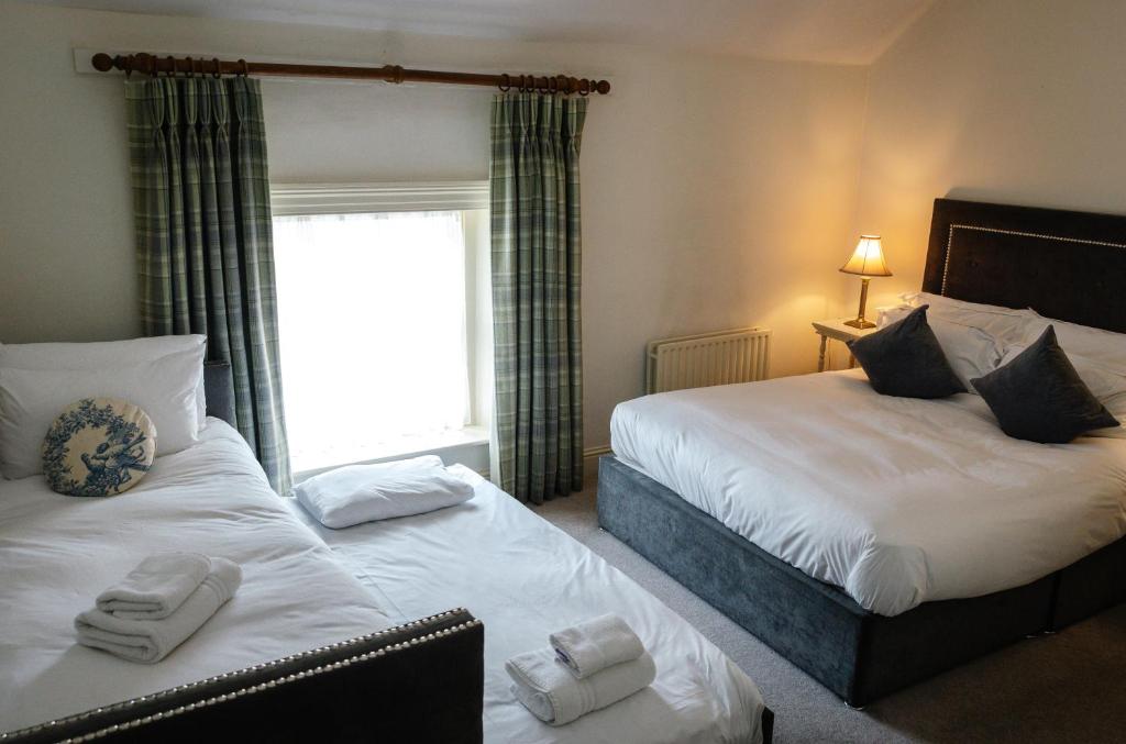 Cama o camas de una habitación en Conyngham Arms Hotel