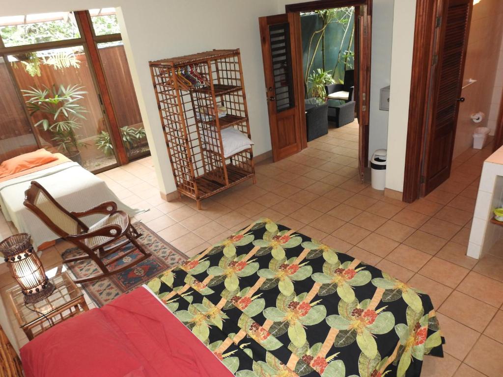Postel nebo postele na pokoji v ubytování Playa Negra Guesthouse
