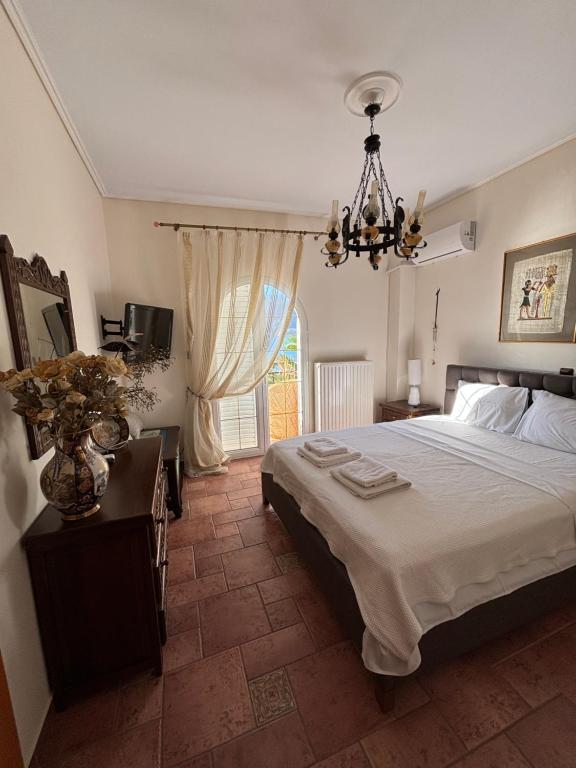 Postel nebo postele na pokoji v ubytování Sunset House