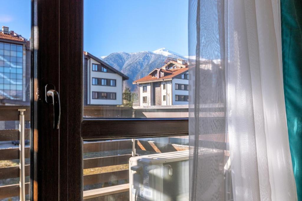 Nespecifikovaný výhled na hory nebo výhled na hory při pohledu z apartmánu