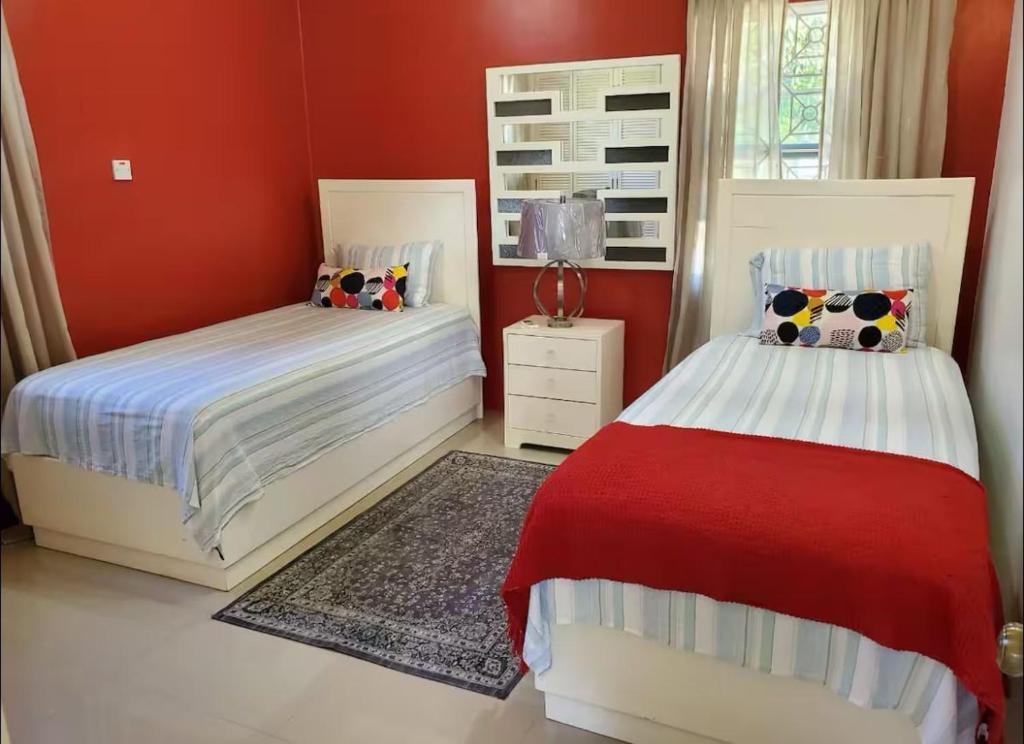 Postel nebo postele na pokoji v ubytování Dreams Palms - Drax Hall Manor