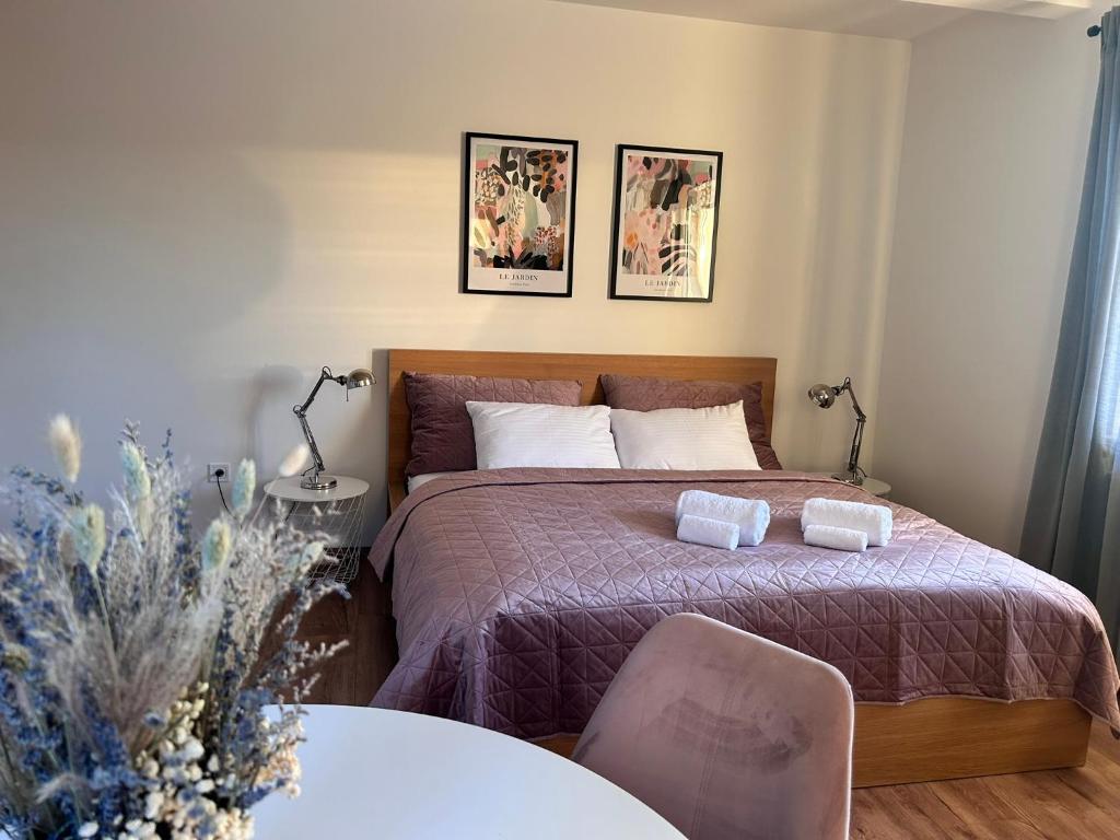 Postel nebo postele na pokoji v ubytování DORMIDARE Apartments Mladá Boleslav