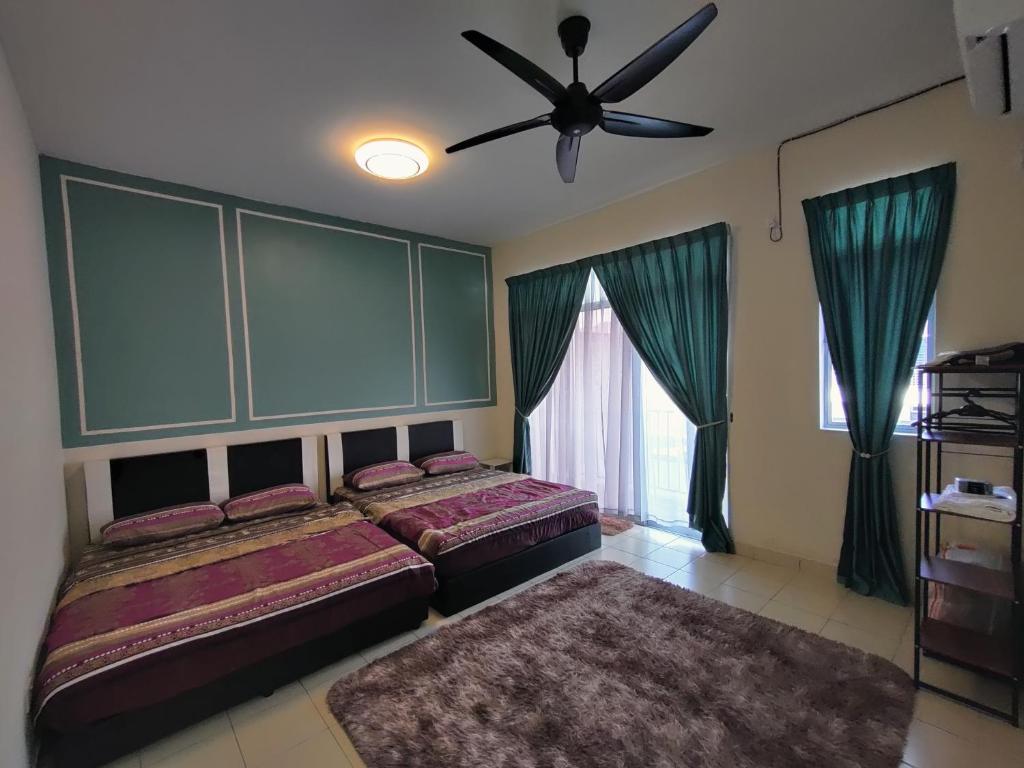 Postel nebo postele na pokoji v ubytování Homestay Adleya
