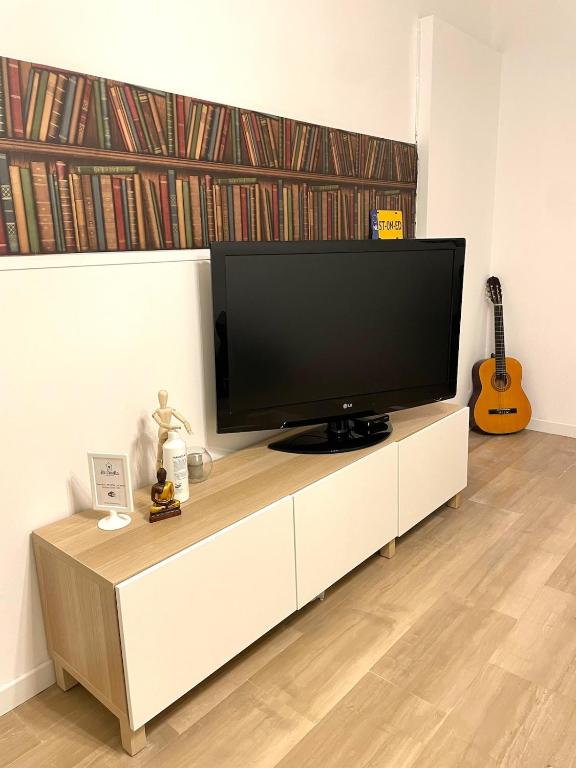 TV a/nebo společenská místnost v ubytování La Casetta