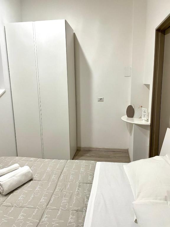 Postel nebo postele na pokoji v ubytování La Casetta